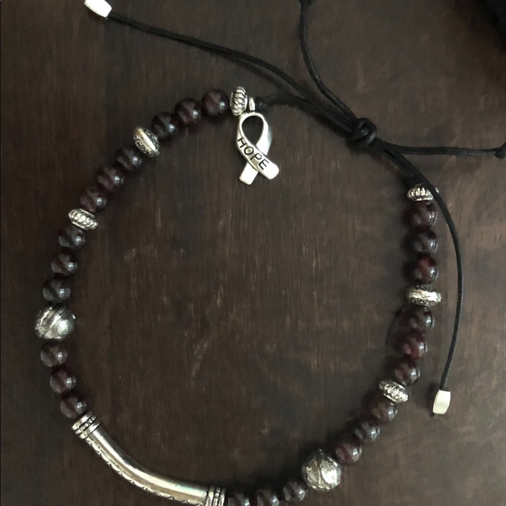 Garnet bracelet, leather adjustable cord